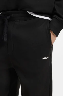 Cotton casual trousers with elasticated cuffs
