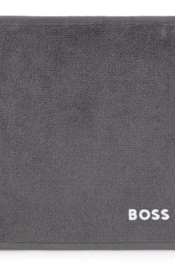 Cotton face cloth with contrast embroidered logo