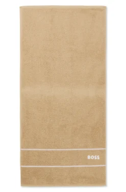 Cotton hand towel with white logo embroidery