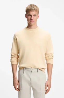 Cotton sweater with ribbed side seams