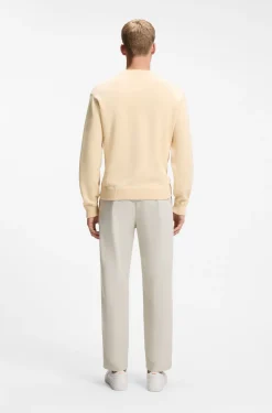 Cotton sweater with ribbed side seams