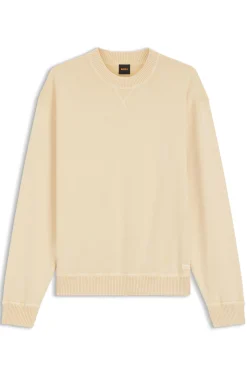 Cotton sweater with ribbed side seams