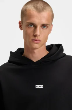 Cotton-terry loose-fit hoodie with logo details