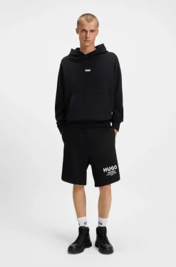 Cotton-terry loose-fit hoodie with logo details