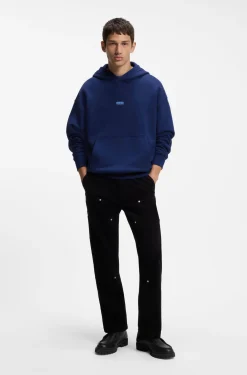 Cotton-terry loose-fit hoodie with logo details
