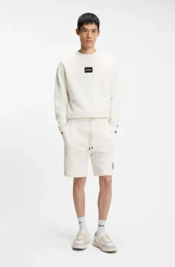 Cotton-terry shorts with tortoiseshell logo