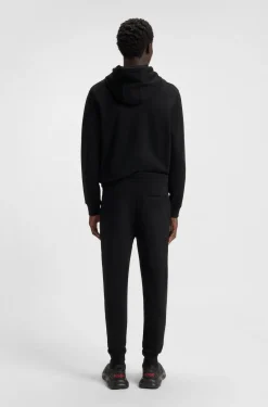 Cotton-terry tracksuit bottoms with red logo label