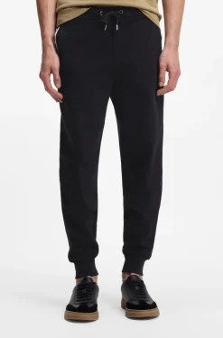 Cotton-terry tracksuit bottoms with signature stripes