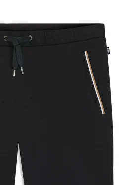 Cotton-terry tracksuit bottoms with signature stripes
