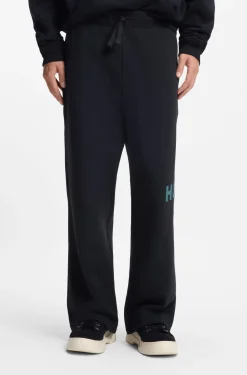 Cotton-terry tracksuit bottoms with logo print