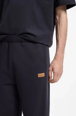 Cotton-terry tracksuit bottoms with logo badge