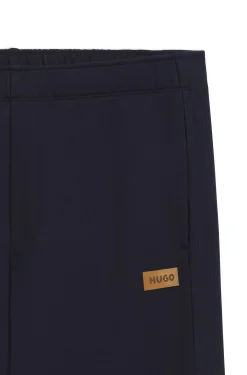 Cotton-terry tracksuit bottoms with logo badge