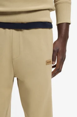 Cotton-terry tracksuit bottoms with logo badge