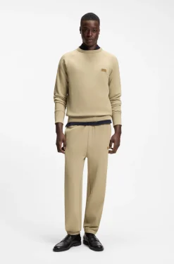 Cotton-terry tracksuit bottoms with logo badge