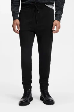 Cotton-terry tracksuit bottoms with logo patch