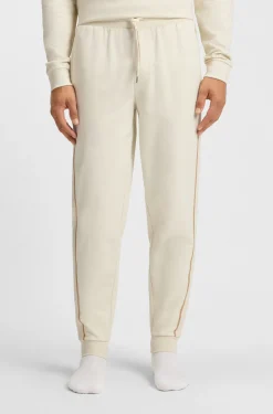 Cotton-terry tracksuit bottoms with tape and logo