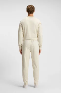 Cotton-terry tracksuit bottoms with tape and logo
