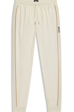 Cotton-terry tracksuit bottoms with tape and logo