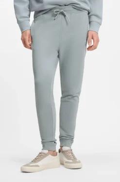 Cotton-terry tracksuit bottoms with logo patch