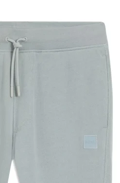 Cotton-terry tracksuit bottoms with logo patch