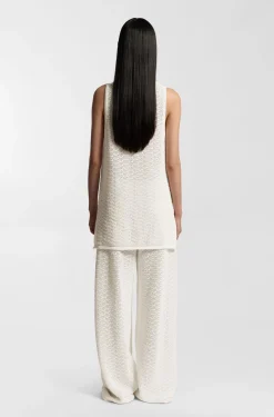 Cotton trousers with micro-lace structure