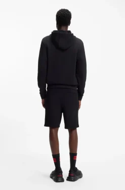 Cuffed loungewear bottoms in stretch cotton with logo print