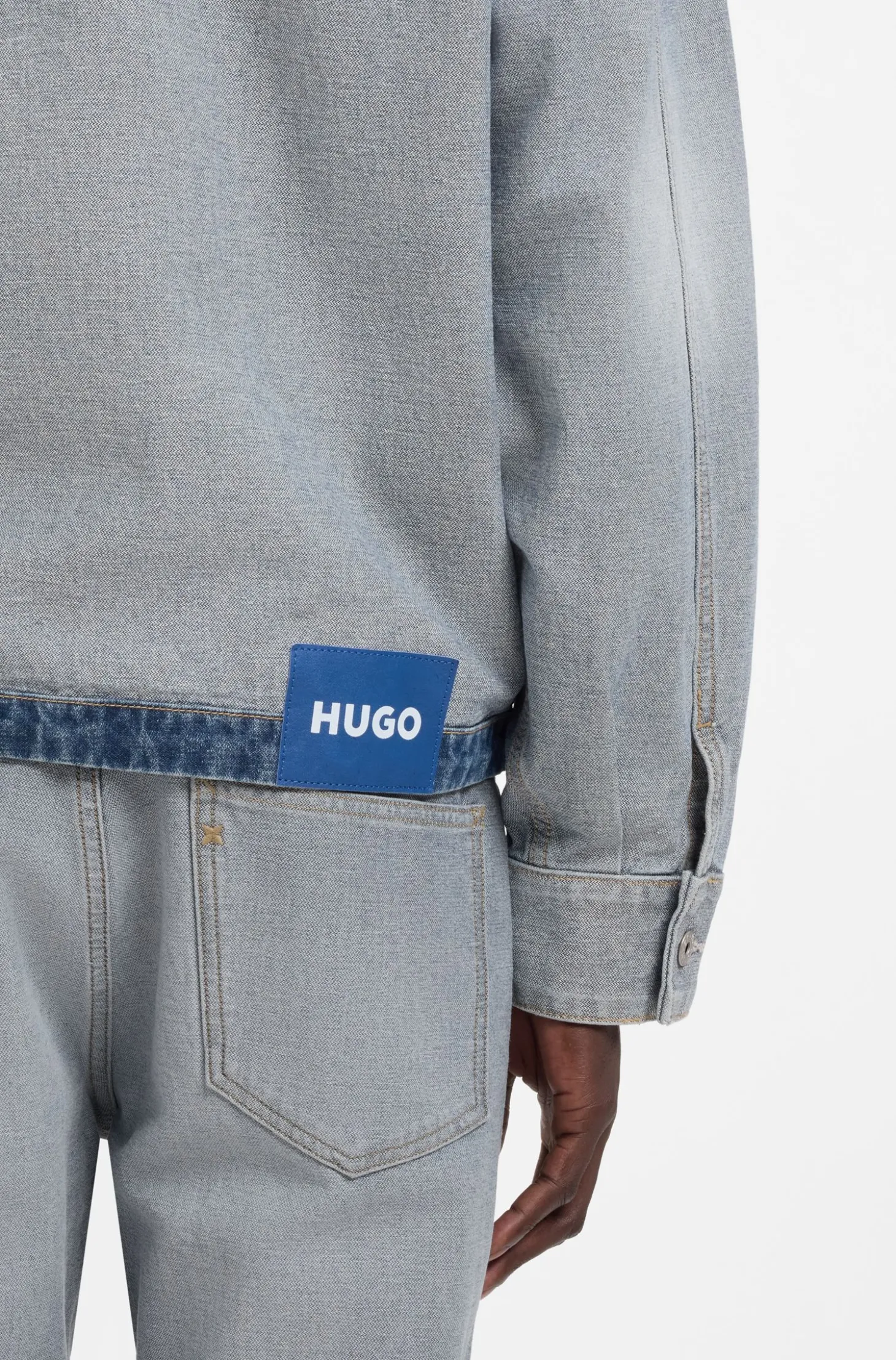 Denim jacket with inside-out styling