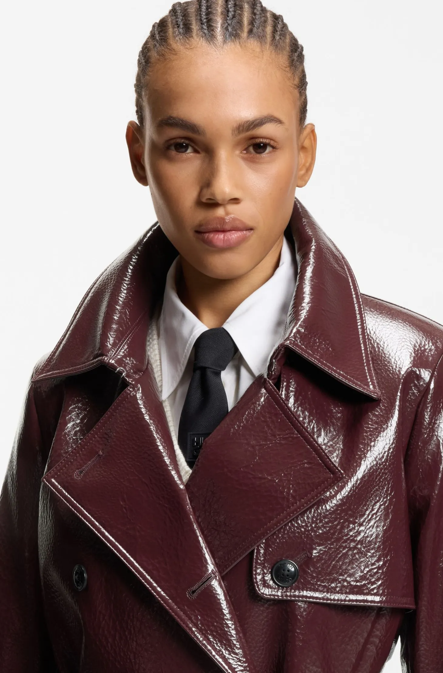 Double-breasted trench coat in faux leather