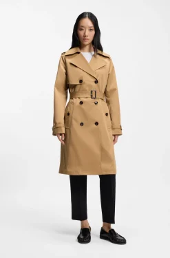 Double-breasted trench coat with buckled belt