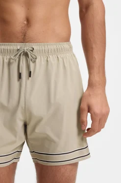 Drawstring swim shorts in stretch fabric with tape trim