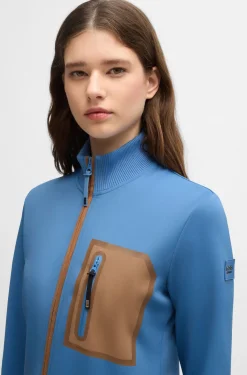 Equestrian cardigan with zipped chest pocket