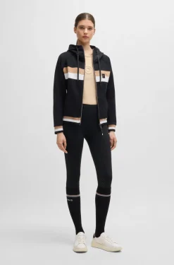 Equestrian full-grip breeches with four-way stretch