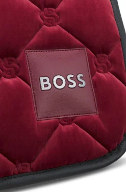 Equestrian jumping saddle pad in velvet