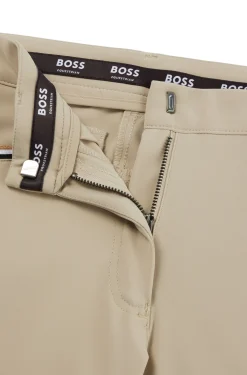 Equestrian knee-grip breeches in power-stretch material