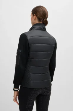 Equestrian mixed-material jacket with sleeve pocket