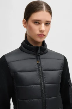 Equestrian mixed-material jacket with sleeve pocket