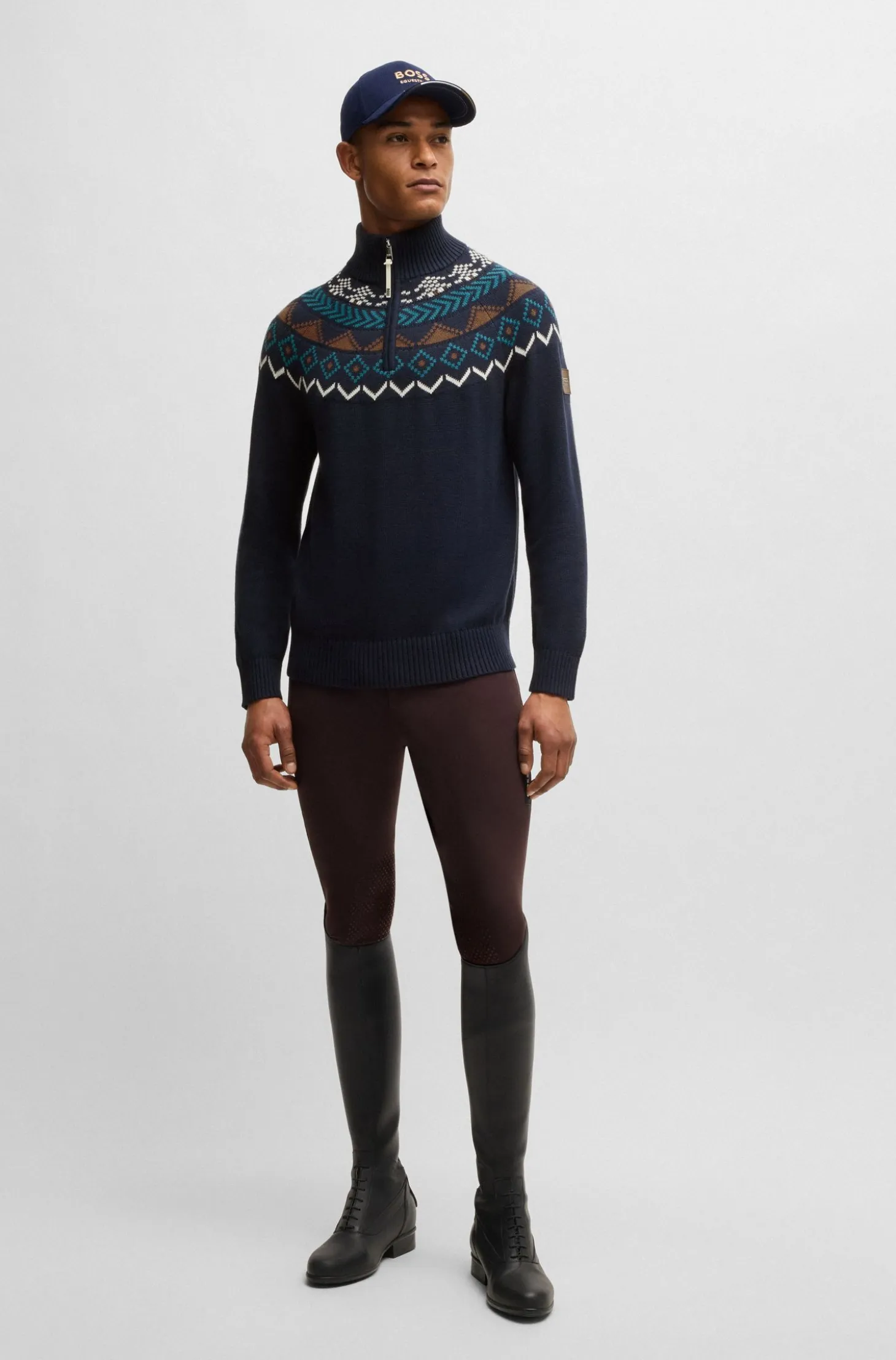 Equestrian troyer sweater with knitted pattern