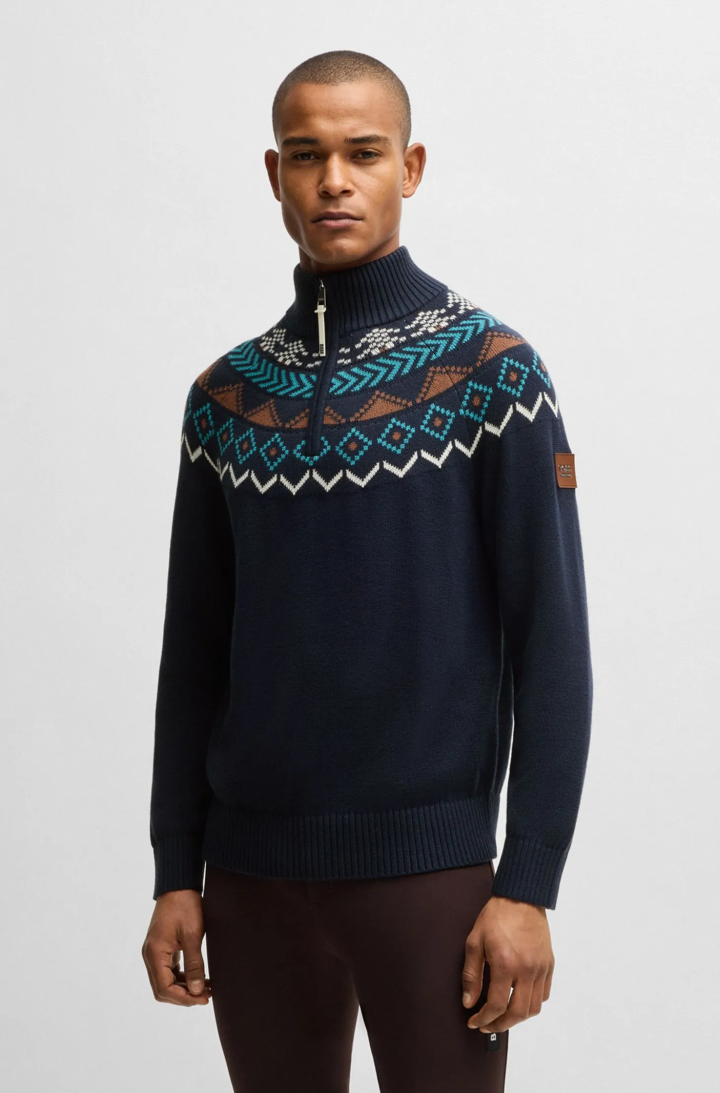 Equestrian troyer sweater with knitted pattern