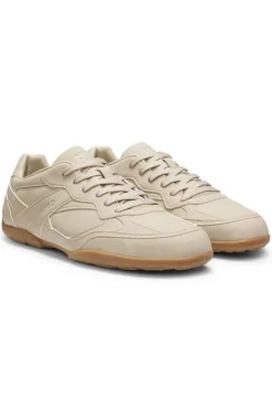 Faux-leather trainers with stacked logos