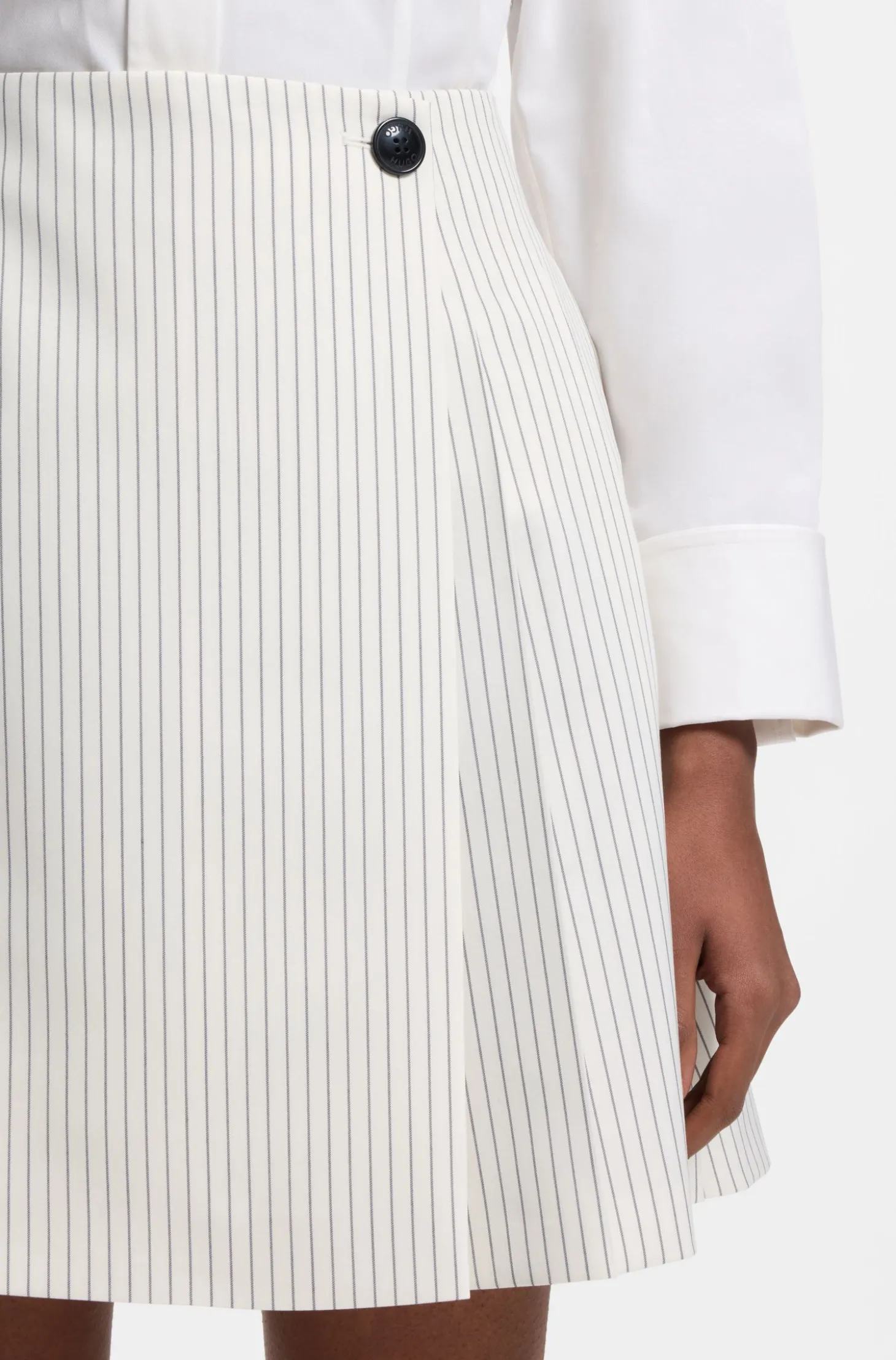 Faux-wrap mini skirt with pinstripe