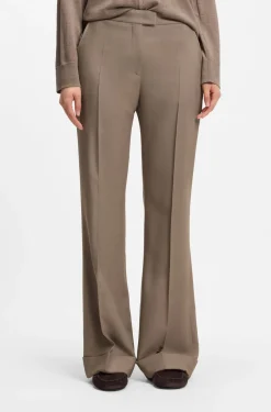Flared-fit trousers in stretch gabardine