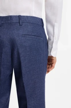 Formal trousers in micro-patterned stretch fabric