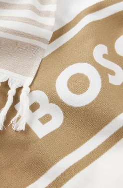 Fringed logo beach towel in cotton jacquard