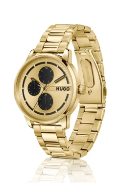 Gold-tone watch with black subeyes