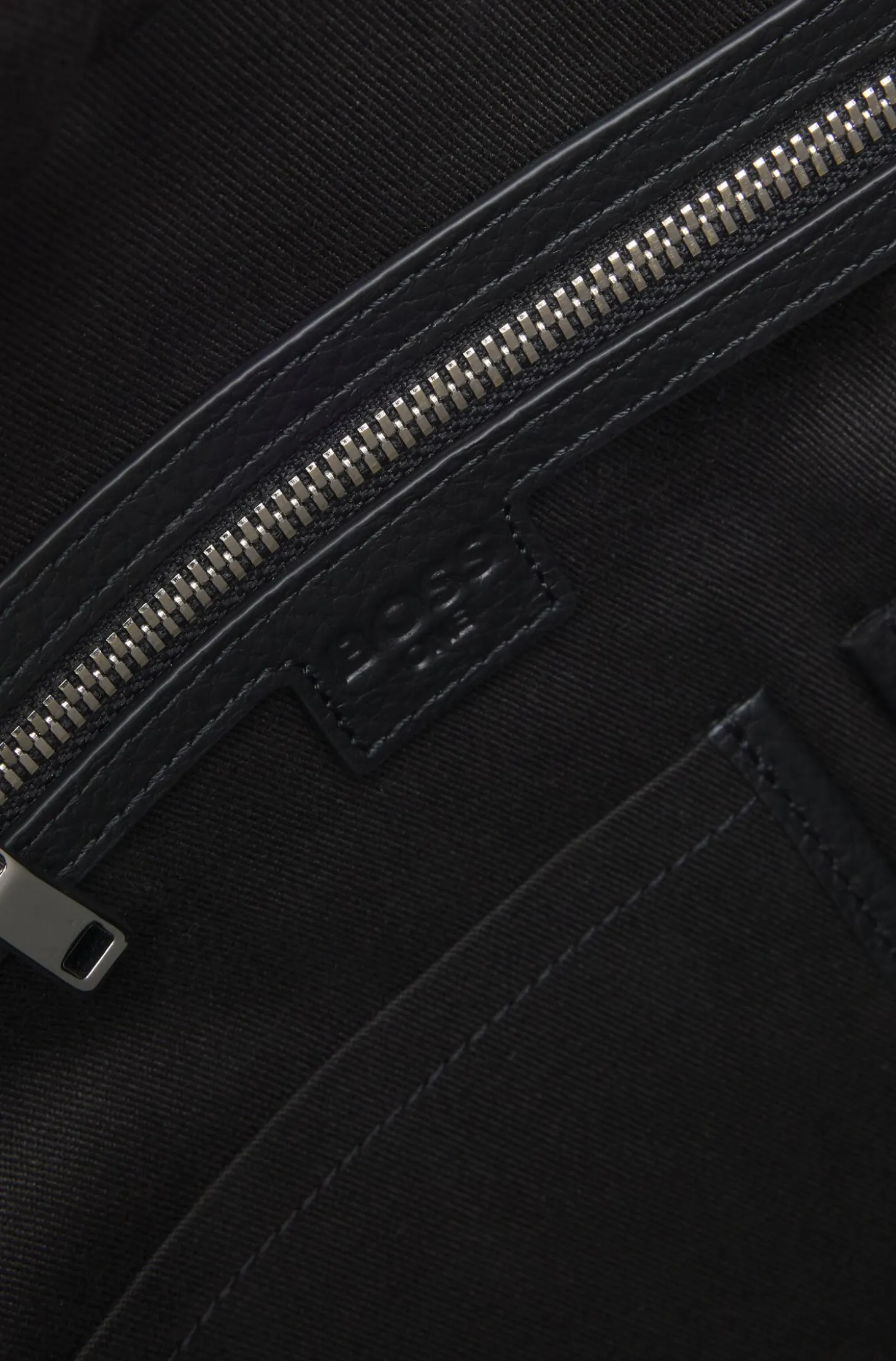 Grained-leather holdall with embossed logo