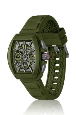 Green skeleton-dial watch with silicone strap