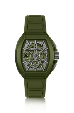Green skeleton-dial watch with silicone strap