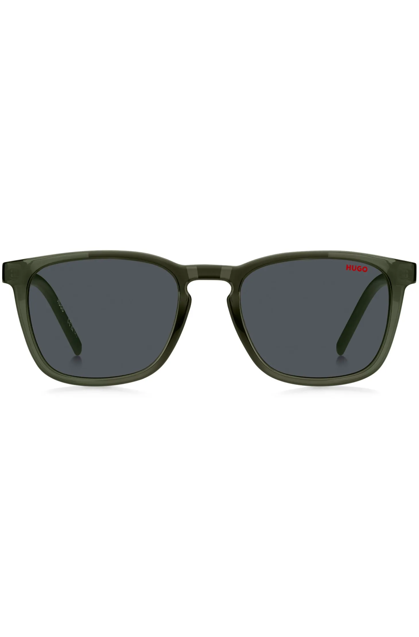 Green sunglasses with patterned temples