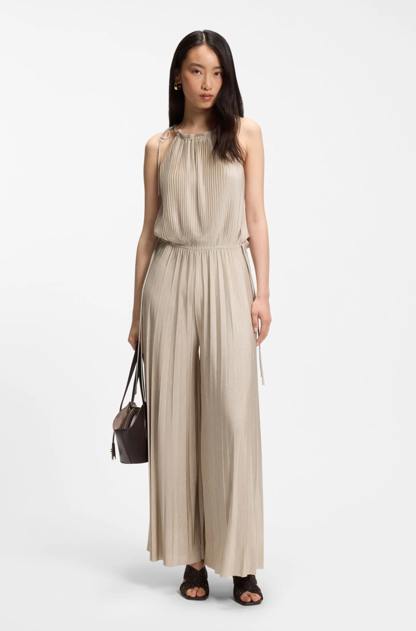 Halterneck jumpsuit in lustrous jersey with plissé pleats