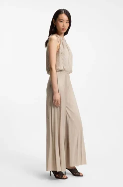 Halterneck jumpsuit in lustrous jersey with plissé pleats